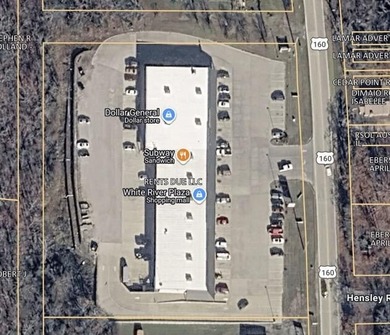 White River Plaza is a prominently located retail center for - photo 2