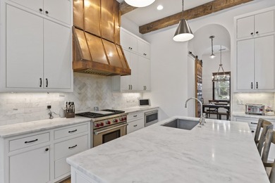 Tucked within the exclusive, gated waterfront community of - photo 12
