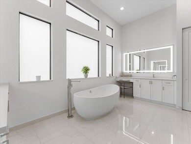 Welcome to this stunning 2025 built home in Lotus Edge, set on - photo 16