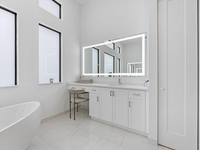 Welcome to this stunning 2025 built home in Lotus Edge, set on - photo 18