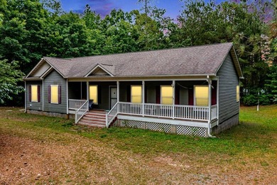 Discover the perfect blend of waterfront living, privacy, and - photo 1