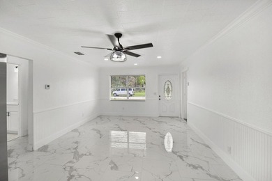 Fully renovated 3-bedroom, 2-bath home featuring a desirable - photo 4