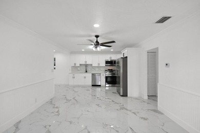 Fully renovated 3-bedroom, 2-bath home featuring a desirable - photo 5