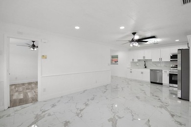 Fully renovated 3-bedroom, 2-bath home featuring a desirable - photo 6