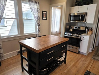 Large update 4 bedroom, 1.5 bath home. 2 blocks from lake - photo 11