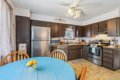 Welcome to this spacious 4-bedroom, 1.5-bath high ranch nestled - photo 12