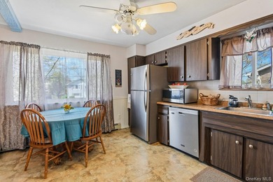 Welcome to this spacious 4-bedroom, 1.5-bath high ranch nestled - photo 13