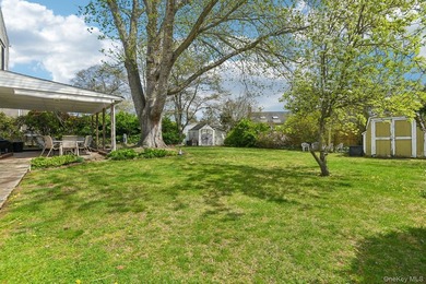 Welcome to this spacious 4-bedroom, 1.5-bath high ranch nestled - photo 25