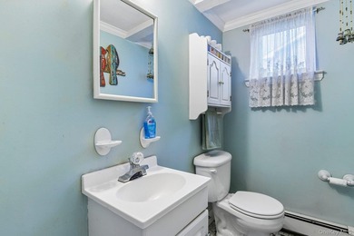Welcome to this spacious 4-bedroom, 1.5-bath high ranch nestled - photo 32