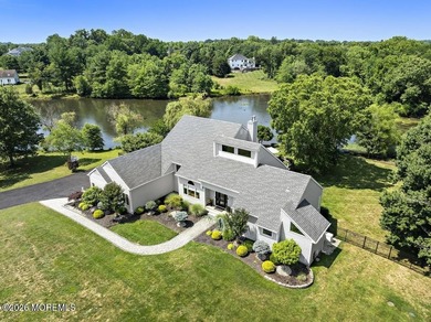 Set on 4.66 serene, private acres with a beautifully landscaped - photo 1