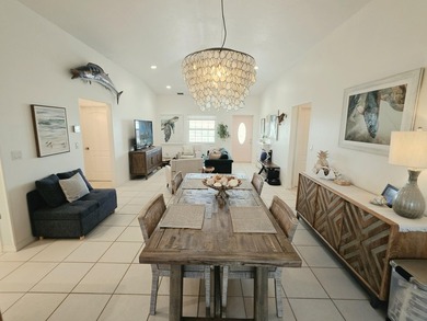Elevated Coastal Living in Breezeswept Beach Estates. Skip the - photo 5