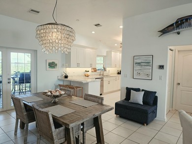 Elevated Coastal Living in Breezeswept Beach Estates. Skip the - photo 6