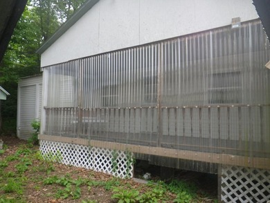 Pine township. Secluded double wide on 2 wooded flat acres in - photo 3