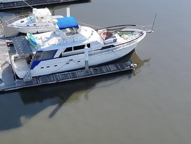 Yacht Slip I-29 provides a 55' x 18' T-head berth at the end of - photo 1
