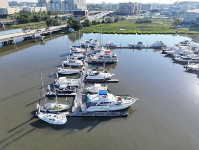 Yacht Slip I-29 provides a 55' x 18' T-head berth at the end of - photo 2