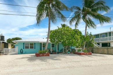 Waterfront Duplex with Income Potential in Big Pine Key! Live - photo 1