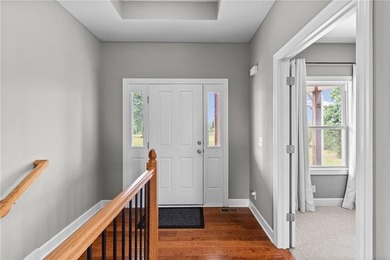 Perched atop 8+ acres, this beautiful reverse 1.5-story home - photo 2