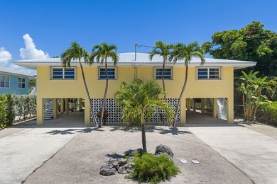 Rare canal-front duplex on Duck Key's prestigious Indies Canal - photo 1