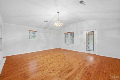 Built in 2006, this 3-bedroom, 2-bath brick home sits on a full - photo 12