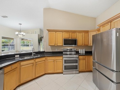 Welcome to your private oasis in the desirable Acreage area of - photo 12