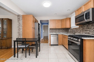 South Beach - welcome to this 6/6 2-family, fully brick, and - photo 18