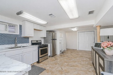 South Beach - welcome to this 6/6 2-family, fully brick, and - photo 26