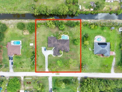 Welcome to your private oasis in the desirable Acreage area of - photo 42