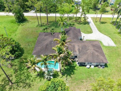 Welcome to your private oasis in the desirable Acreage area of - photo 44
