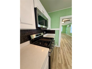 This property features a spacious two-bedroom layout with a - photo 19
