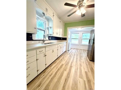 This property features a spacious two-bedroom layout with a - photo 20