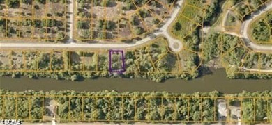 Rare canal waterfront lot located on the Cocoplum Waterway, the - photo 2