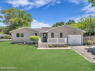 Beautifully updated and move-in ready, this expanded 3-bedroom/2 - photo 1
