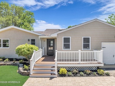 Beautifully updated and move-in ready, this expanded 3-bedroom/2 - photo 2