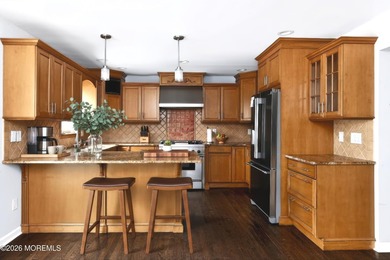 Welcome to this beautifully maintained 4-bedroom, 3 full-bath - photo 2