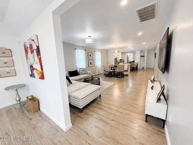 Completely reimagined, this exceptional raised ranch offers 3 - photo 7