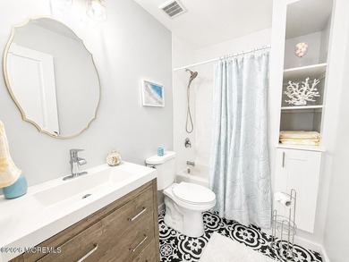 Completely reimagined, this exceptional raised ranch offers 3 - photo 9