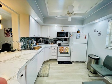 Tucked away on the fourth floor of the welcoming 55+ community - photo 1