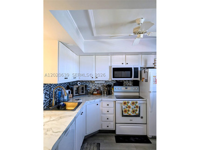 Tucked away on the fourth floor of the welcoming 55+ community - photo 2