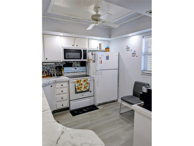 Tucked away on the fourth floor of the welcoming 55+ community - photo 3