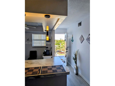 Tucked away on the fourth floor of the welcoming 55+ community - photo 6