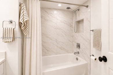 Welcome to this beautifully renovated first-floor condo in the - photo 13