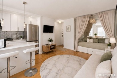 This adorable alcove studio offers a smart, comfortable layout - - photo 4