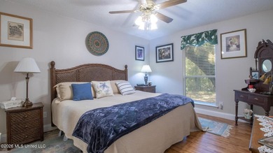 Located in the heart of Diamondhead, this spacious home sits on - photo 17
