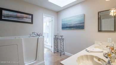 Located in the heart of Diamondhead, this spacious home sits on - photo 20