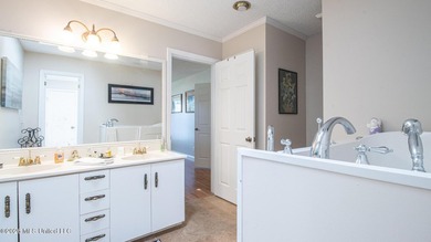 Located in the heart of Diamondhead, this spacious home sits on - photo 21