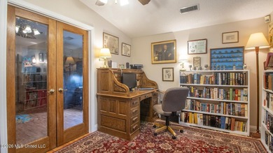 Located in the heart of Diamondhead, this spacious home sits on - photo 24