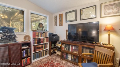 Located in the heart of Diamondhead, this spacious home sits on - photo 25