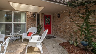 Located in the heart of Diamondhead, this spacious home sits on - photo 30