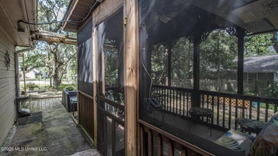 Located in the heart of Diamondhead, this spacious home sits on - photo 31