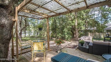 Located in the heart of Diamondhead, this spacious home sits on - photo 34